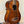 Beautiful brown acoustic bass ukulele with striped wood grain, Kala Left-Handed U-Bass