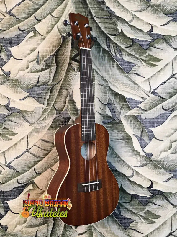 Kala Mahogany Concert Ukulele with four strings and a rich gloss mahogany finish