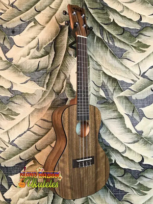 Wooden ukulele with dark brown finish from Kala Pacific’s premier exotic series
