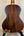 Acoustic guitar with dark wood grain back, showcasing the Kala SA-T Tenor Ukulele