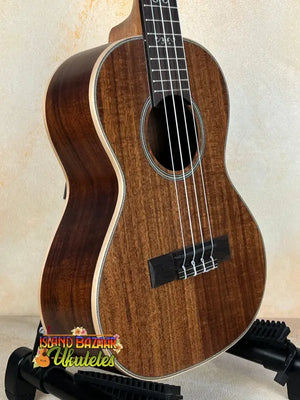 Beautiful Kala SA-T Tenor Ukulele featuring dark grain and black tuning pegs