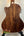Acoustic guitar back panel of Kala SA-TE-C Tenor Electric with rich walnut wood grain