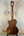Wooden acoustic guitar with dark finish featured in Kala SA-TE-C Tenor Electric Ukulele