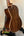 Acoustic guitar with dark wood back, showcasing Kala SA-TE-C Tenor Electric Ukulele
