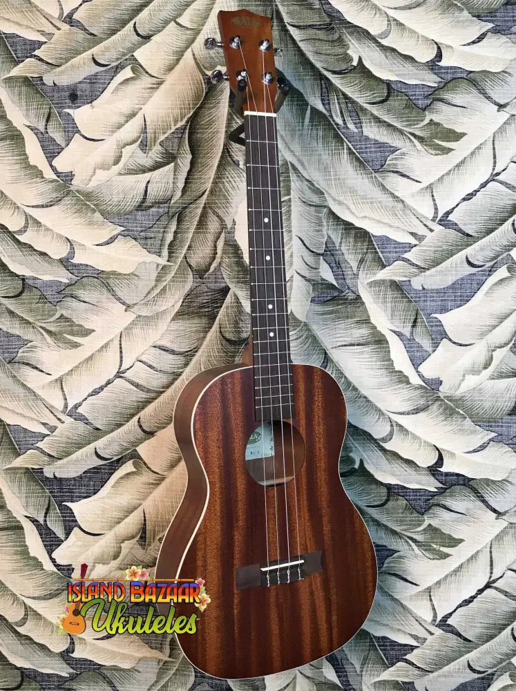 Kala Satin Mahogany Baritone Ukulele Model KA-B with dark wood grain and Aquila Super Nylgut strings