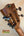 Wooden headstock with tuning pegs of the Kala SMH-CG Concert Ukulele in solid mahogany