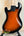 Sunburst-finished electric bass guitar with black neck plate for Kala Solid Body U•BASS®