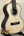 Wooden Kala Solid Spruce Top Tenor Ukulele Striped Wood KA-SSEBY-T on a stand