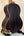 Dark wooden acoustic guitar on a stand next to Kala Solid Spruce Tenor Ukulele Striped
