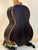 Dark wooden acoustic guitar on a stand next to Kala Solid Spruce Tenor Ukulele Striped