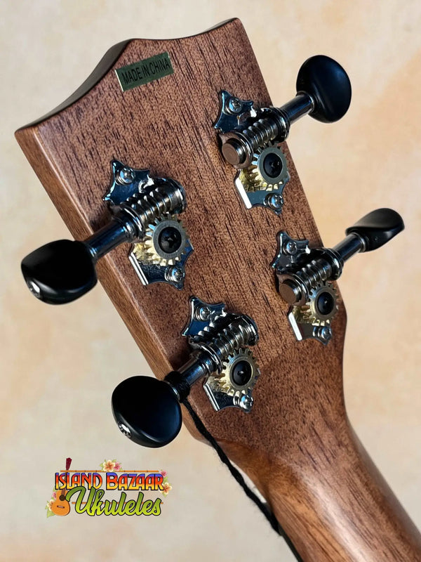 Wooden guitar headstock with black tuning pegs on Kala Solid Spruce Tenor Ukulele Striped