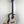 Natural wood Kala Spruce Baritone Ukulele with dark binding and EQ, featuring striped ebony