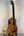Wooden Kala U-Bass Nomad acoustic-electric bass ukulele with four strings and pickup
