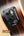 Black Fishman UltraBass preamp control panel on Kala UBASS-EBY-FSRW Striped Ebony Acoustic-Electric Bass Ukulele