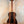 Wooden bass ukulele with striped dark grain pattern Kala UBASS-EBY-FSRW Striped Ebony Acoustic-Electric