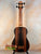 Wooden bass ukulele with striped dark grain pattern Kala UBASS-EBY-FSRW Striped Ebony Acoustic-Electric