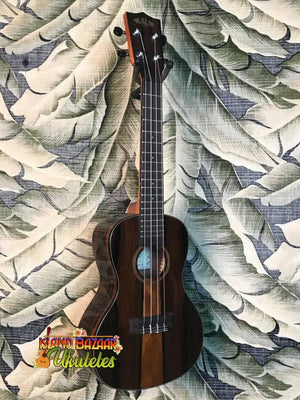 Dark wooden Kala Ziricote-Series Baritone Ukulele Model KA-ZCT-B with four strings