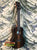 Dark wooden Kala Ziricote-Series Baritone Ukulele Model KA-ZCT-B with four strings