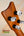 Guitar headstock with silver tuning pegs on Kamaka Concert Ukulele HF-2 in Solid Hawaiian Koa