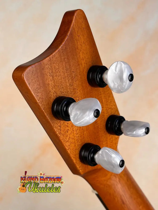 Guitar headstock with silver tuning pegs on Kamaka Concert Ukulele HF-2 in Solid Hawaiian Koa