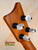 Guitar headstock with silver tuning pegs on Kamaka Concert Ukulele HF-2 in Solid Hawaiian Koa