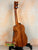 Wooden Kamaka Concert Ukulele HF-2 in solid Hawaiian Koa on a black stand