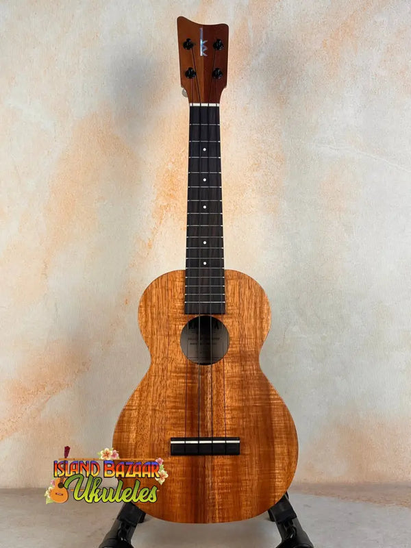 Wooden Kamaka Concert Ukulele HF-2 with natural Koa finish and black fretboard