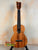 Wooden Kamaka Concert Ukulele HF-2 with natural Koa finish and black fretboard