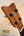 Wooden ukulele headstock with tuning pegs on Kamaka Concert Ukulele HF-2 in solid Hawaiian Koa