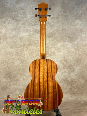 Wooden ukulele back showcasing Kamaka HF-3 Tenor design on the Kamaka HF-3 Ukulele