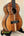 Kamaka HF3-D2i Tenor Uke Deluxe showcasing beautiful koa wood and striking grain patterns