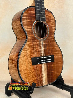 Kamaka HF3-D2i Tenor Uke Deluxe showcasing beautiful koa wood and striking grain patterns