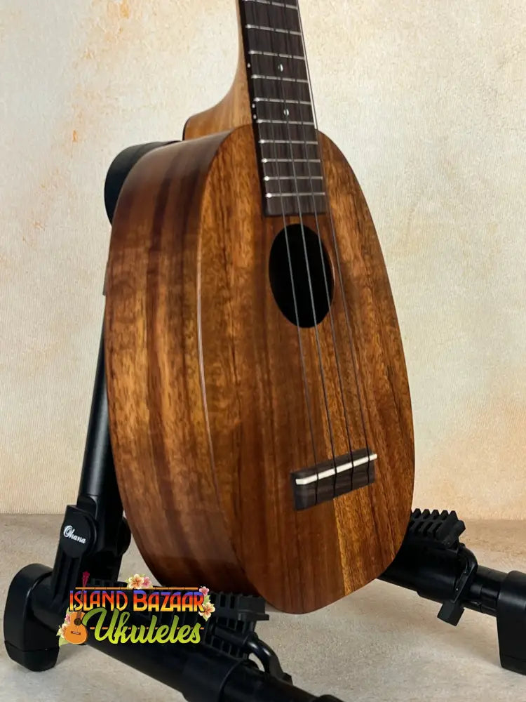 Kamaka HP-1 Pineapple Soprano Ukulele featuring solid Hawaiian Koa wood grain