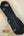 Black leather ukulele case with Kamaka branding for Kamaka HP-1 Pineapple Soprano Ukulele