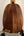 Wooden pumpkin-shaped cutting board featured with Kamaka HP-1 Pineapple Soprano Ukulele