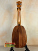 Wooden Kamaka HP-1 Pineapple Soprano Ukulele with natural finish and black stand