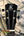 Black headstock of Kanile’a Concert Ukulele with K logo and tuning pegs, Curly Hawaiian Premium Koa