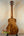Wooden ukulele back showing the Kanileʻa D-1 T Pro Tenor Ukulele with solid Hawaiian koa