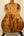 Figured koa ukulele back showcasing Kanileʻa D-1 T Pro tenor ukulele with deluxe gig bag