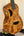 Brown Kanileʻa D-1 tenor ukulele with sound holes in solid Hawaiian koa and deluxe gig bag