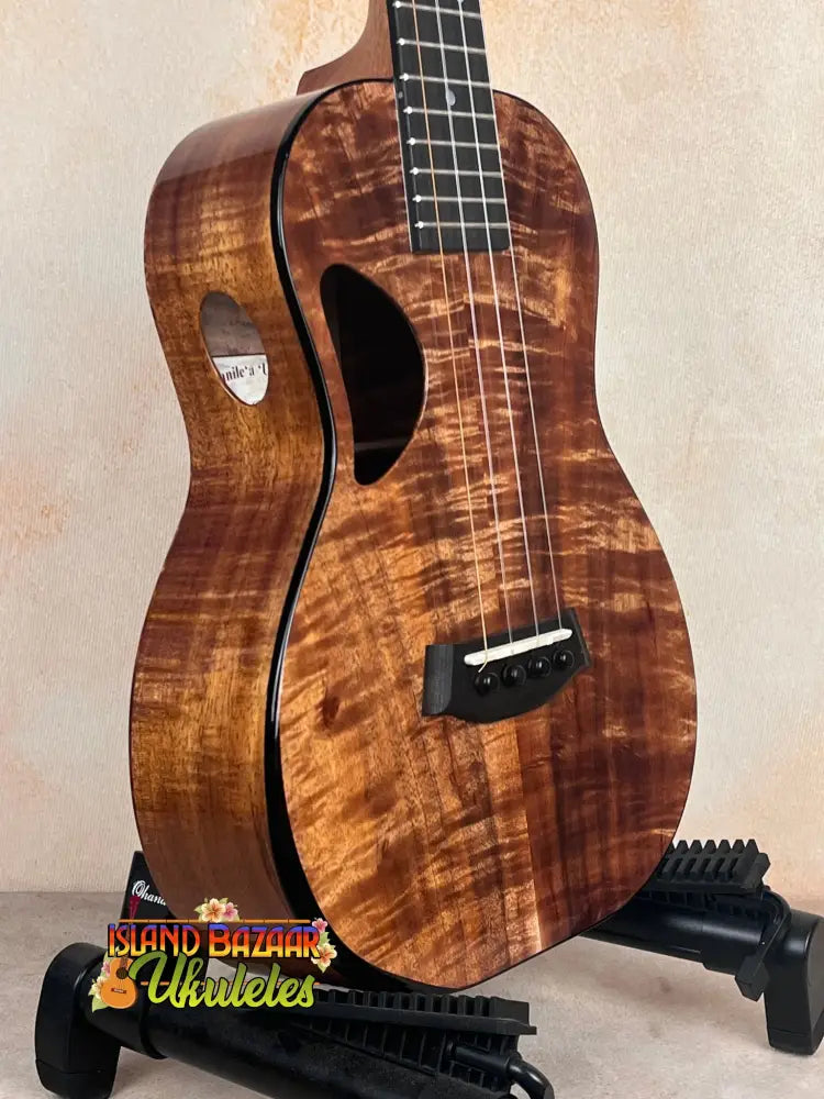 Beautiful Kanile’a DK-T D-Hole Tenor Ukulele crafted from premium koa wood with curly grain