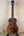 Beautiful Koa wood Kanile’a DK-T D-Hole Tenor Ukulele with black tuning pegs