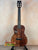 Beautiful Koa wood Kanile’a DK-T D-Hole Tenor Ukulele with black tuning pegs