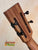 Wooden guitar headstock with black tuning pegs on Kanile’a DK-T D-Hole Tenor Ukulele