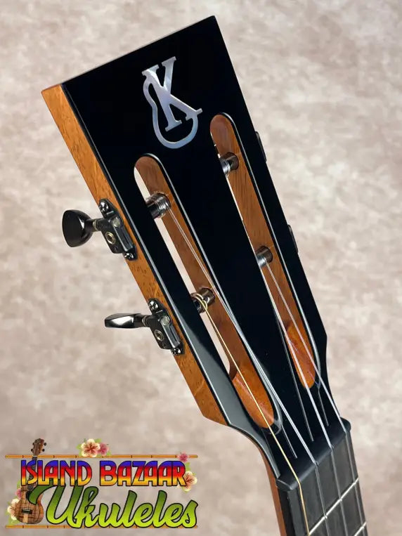 Kanile’a DK-T Pro tenor ukulele headstock with silver logo and tuning pegs