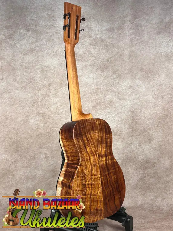 Kanile’a DK-T Pro Tenor Ukulele with Koa Wood on Ukulele Stand