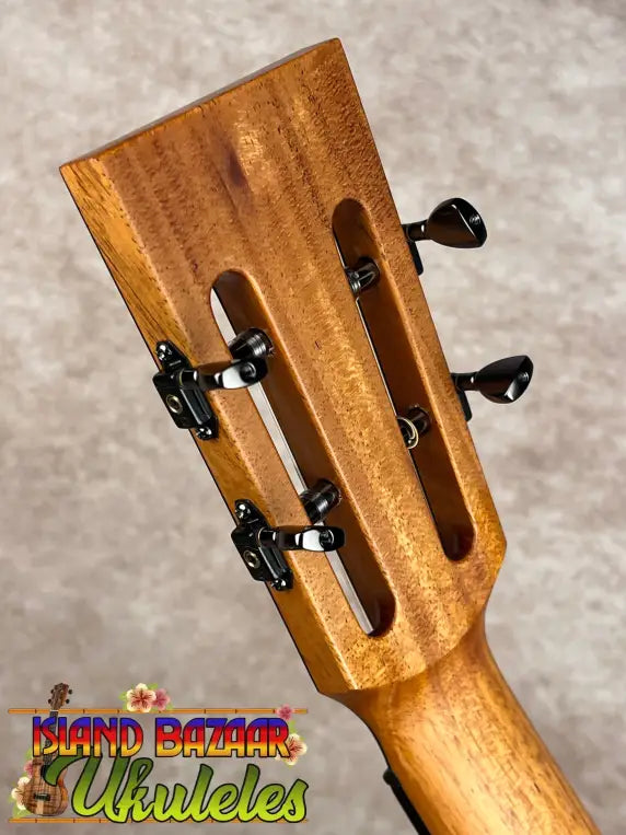Kanile’a DK-T Pro tenor ukulele mahogany headstock with black tuners