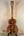Wooden ukulele back showcasing premium koa on Kanile’a DK-T Pro D-Hole Tenor Ukulele