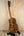 Wooden ukulele with striped pattern from Kanile’a DK-T Pro D-Hole Tenor Ukulele featuring premium koa