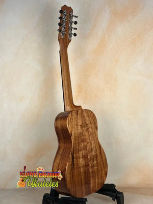 Kanile’a Eight String Tenor Ukulele with distinctive Koa wood grain patterns